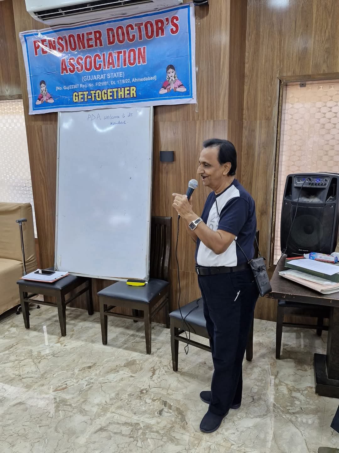 Association member addressing a Pensioner Doctor's Association get-together